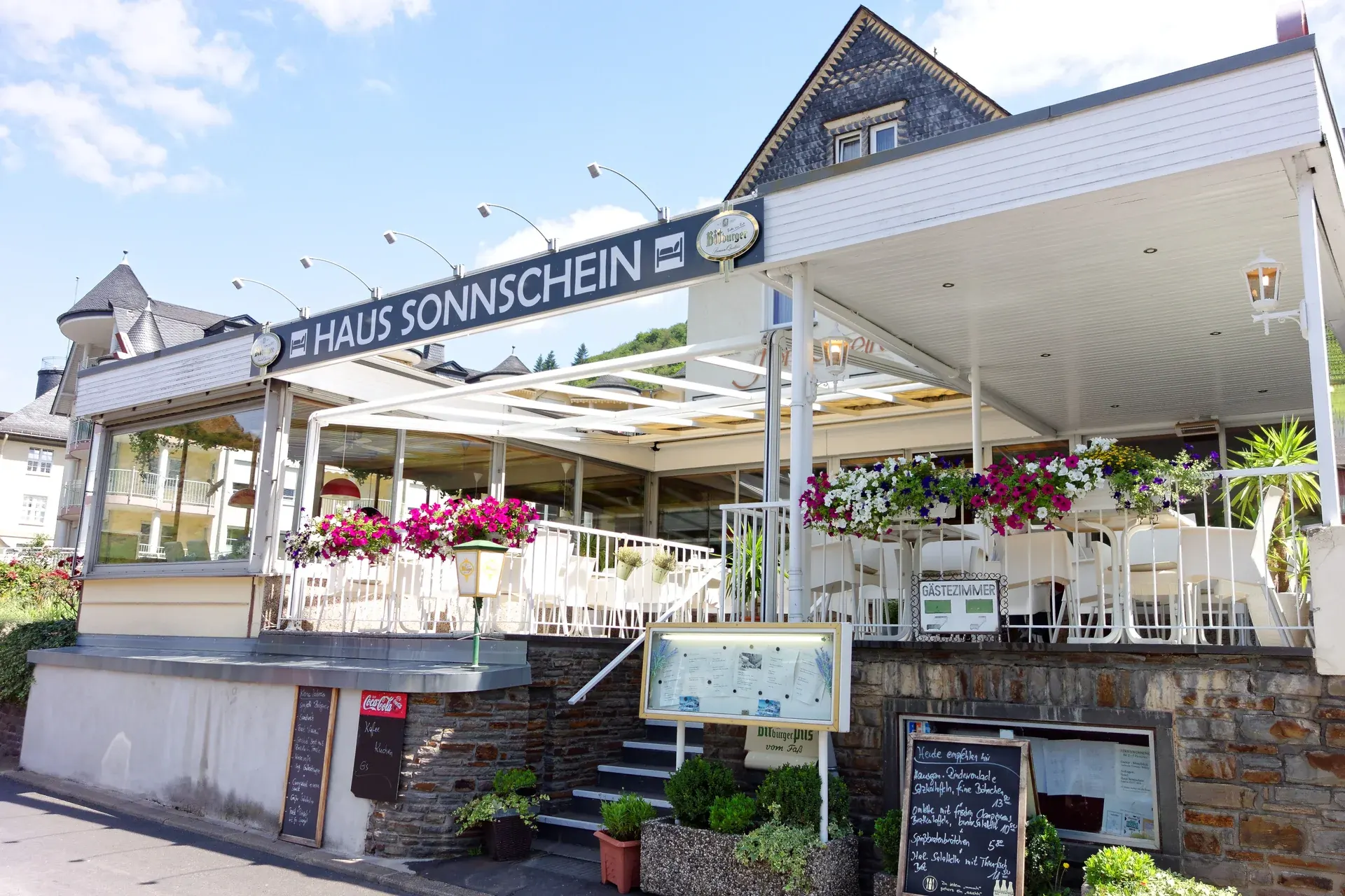 Front of Haus Sonn’schein with balconies and restaurant terrace