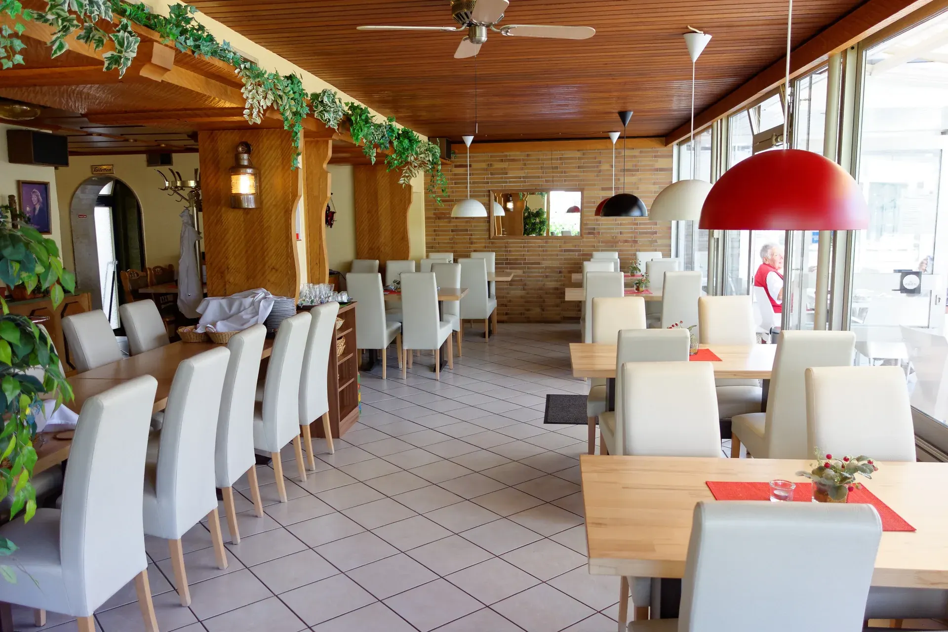 Side view through the furnished restaurant